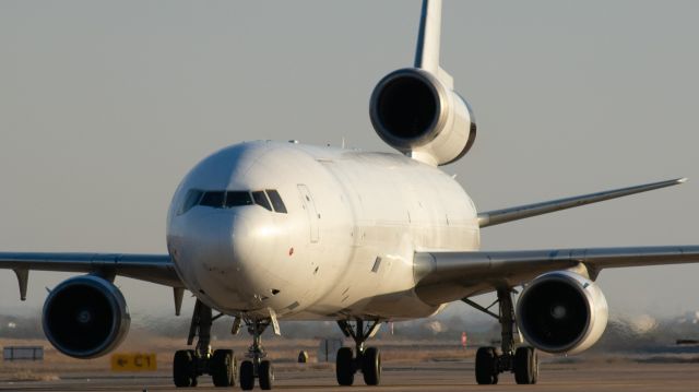 Boeing MD-11 (N435KD) - An unmarked Western Global freighter pulling up to the UPS cargo ramp at Dallas Fort Worth International.