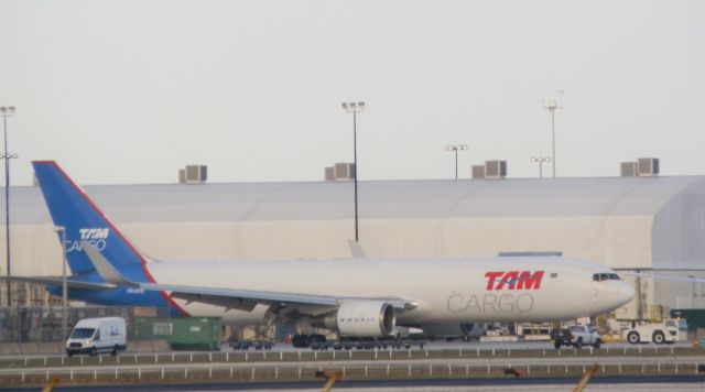 BOEING 767-300 (PR-ACO) - Being towed from cargo terminal!