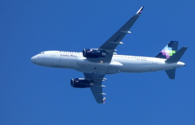 Airbus A320 (N526VL) - On approach is this Volaris Costa Rica Airbus in the Autumn of 2018.  