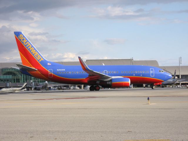 Boeing 737-700 (N256WN) - Holding on RWY 19R