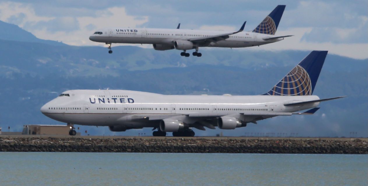 Boeing 747-400 (N107UA) - "...and be advised, company traffic about 30 feet above you!!"