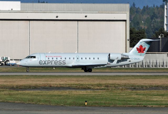 Canadair Regional Jet CRJ-200 (C-GNJA) - Jazz Air planes now painted in Air Canada Express colour. 9 Nov 2012