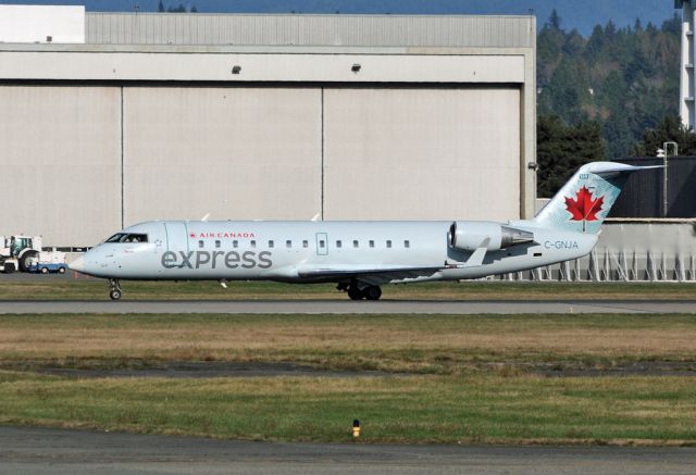 Canadair Regional Jet CRJ-200 (C-GNJA) - Jazz Air planes now painted in Air Canada Express colour. 9 Nov 2012