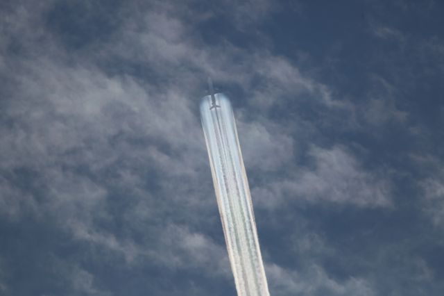 BOEING 777-300 (JA733J) - 25 Sep. 2014: Overflying above New Chitose Airport (CTS), Japan.