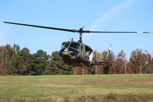 Bell UH-1V Iroquois (N104HF) - A Bell UH-1V Iroquois arriving at Folsom Field, Cullman Regional Airport, AL - November 4, 2017.