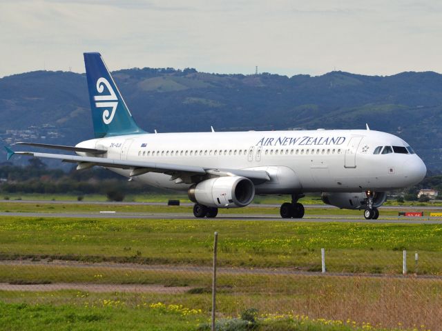 Airbus A320 (ZK-OJI) - On taxi-way heading for take off on runway 05, for flight home to Auckland, New Zealand. Thursday 12th July 2012.