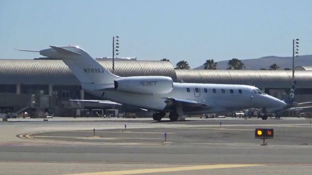 Cessna Citation X (N783XJ) - Just begun rolling down the runway