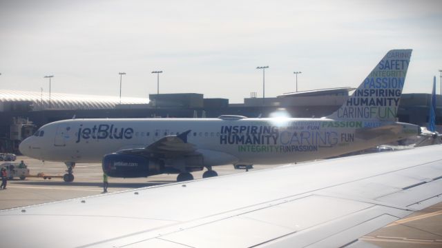 Airbus A320 (N598JB) - Just about to head out to JFK, this JetBlue A320 is wearing the stunning Inspiring Humanity livery. Funnily enough, this was the second JetBlue special livery I saw on this trip, the first being the Blueprint E190.