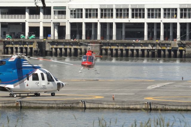 Bell JetRanger (C-GJSD) - Blackcomb Helicopters Bell 206B Jet Ranger landing at Vancouver Harbour heliport