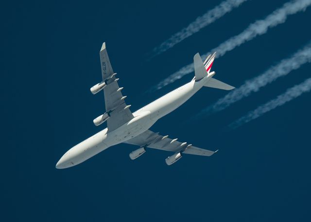 Airbus A340-300 (F-GLZR) - 7/2/16 Air France Airbus A340-300 F-GLZR Passes Overhead West Lancashire, England,UK at FL360 working route Paris CDG-Montreal AFR342.Photograph taken from the ground, Pentax K-5.