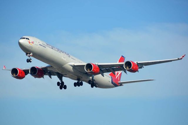 Airbus A340-600 (G-VWKD) - Virgin Atlantic Airways Airbus A340-642 G-VWKD on approach to land at LAX on January 19, 2015. It first flew as F-WWCQ on October 7, 2005. Its construction number is 706. It was delivered to Virgin Atlantic Airways on November 28, 2005. 