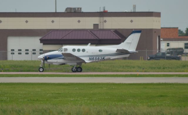 Beechcraft King Air 90 (N6563K) - N6563K taxing to the runway in Sioux falls SD on 6-12-15