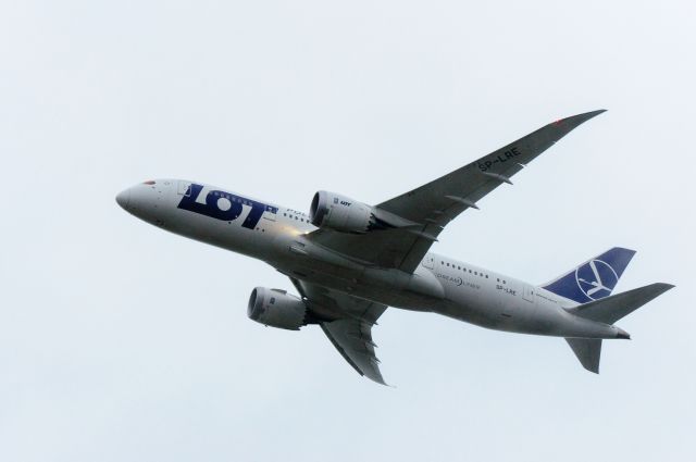 Boeing 787-8 (SP-LRE) - 18Oct2013: On the climb through the rain and low ceiling runway 26.