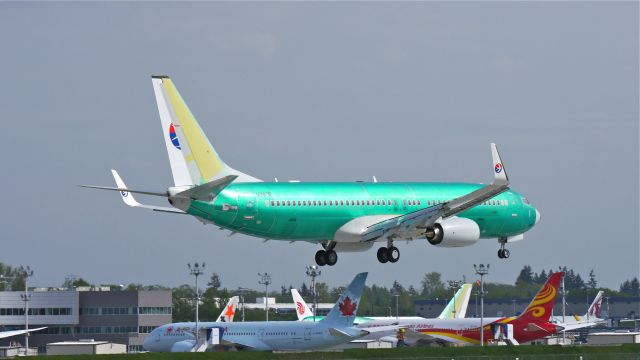 Boeing 737-800 (N1787B) - BOE581 from KRNT on final to Rwy 16R during its maiden flight on 4/21/14. (LN:4893 / cn 41514). The customer is China Eastern Airlines and permanent registration will be B-1933.