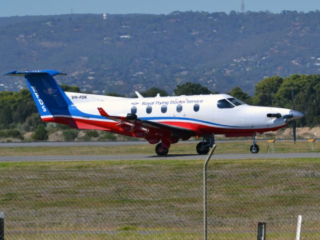 Pilatus PC-12 (VH-FDK) - On taxi-way heading for take off on runway 05 for another mercy flight to the out-back. Thursday 12th April 2012.