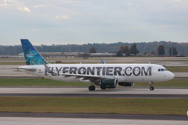 Airbus A320 (N220FR) - Unique livery, this one. the "FlyFrontier.com" titles didnt last long, did they.