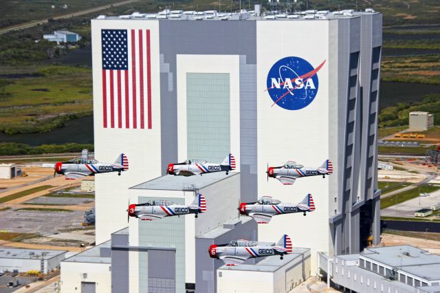 — — - GEICO Skytypers pass VAB at "The Cape" - we were in town to fly the TICO Airshow @ KTIX