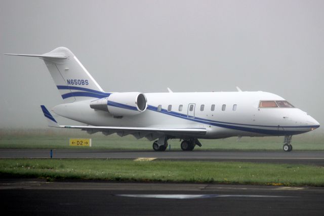 Canadair Challenger (N650BS) - Taxiing to depart rwy 24 on 7-May-22 heading for KBED.