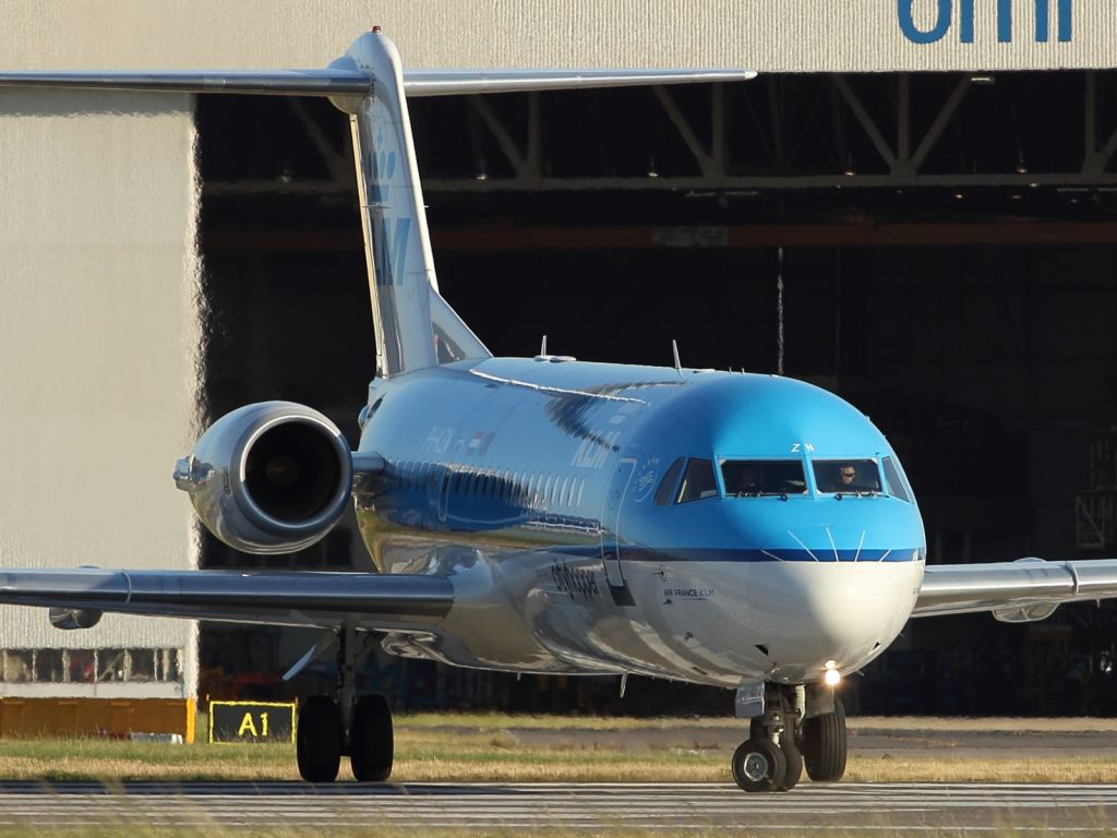 — — - A KLM Fokker F-28 seen here lining up on runway 027R at LHR.