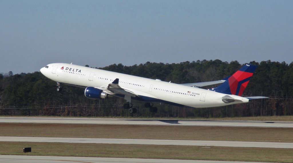 Airbus A330-300 (N825NW) - Delta A333 charter off to Shreveport.  A rare sight at RDU.