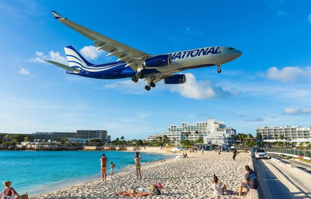 Airbus A330-200 (N819CA) - National Airlines Cargo N819CA over Maho beach for landing on St Maarten.br /First time for the National Airlines with a A330 over the beach 16/01/2021.