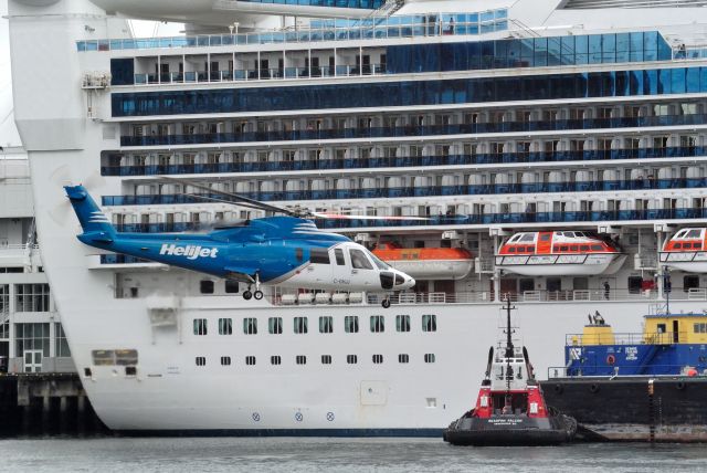 Sikorsky S-76 (C-GHJJ) - Taking off next to the Golden Princess