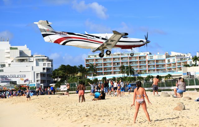 Pilatus PC-12 (F-OSTB) - Pilatus PC-12/47E St Barth Executive making her pass over the beach for landing!