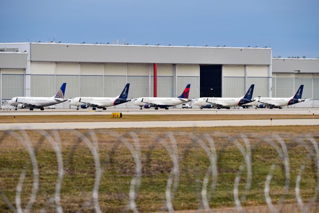 Embraer 175 (N401YX) - Three Republic Livery birds in this shot, N401YX, N403YX, and N826MD