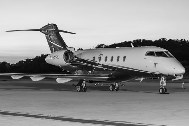 Bombardier Challenger 300 (N522FX) - Flexjet 522 spending the night on the ramp at Butler County Regional Airport.