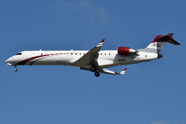 Canadair Regional Jet CRJ-700 (N520JG) - One of the many Joe Gibbs racing team aircraft landing 23-R on 07-31-22