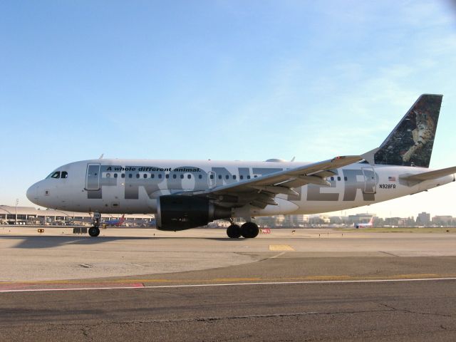 Airbus A319 (N928FR) - Holding short of RWY 19R