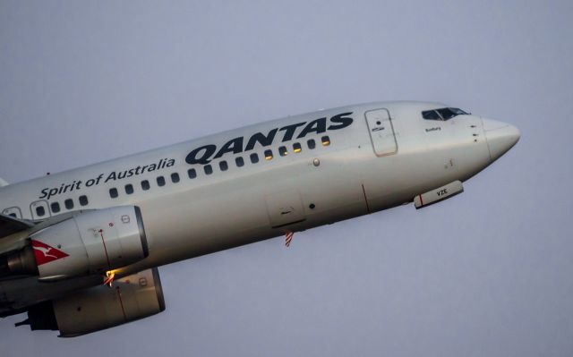 Boeing 737-700 (VH-VZE) - QF766 to Sydney takes off from Adelaide just after sunset