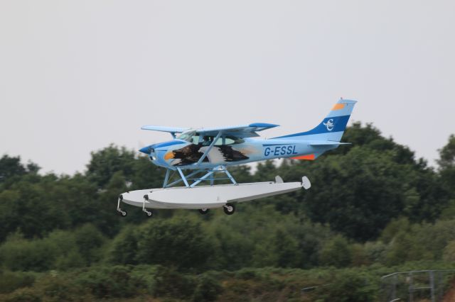 Cessna Skylane (G-ESSL) - View from the Blackbushe Cafe ....back from splashing in the Solent 