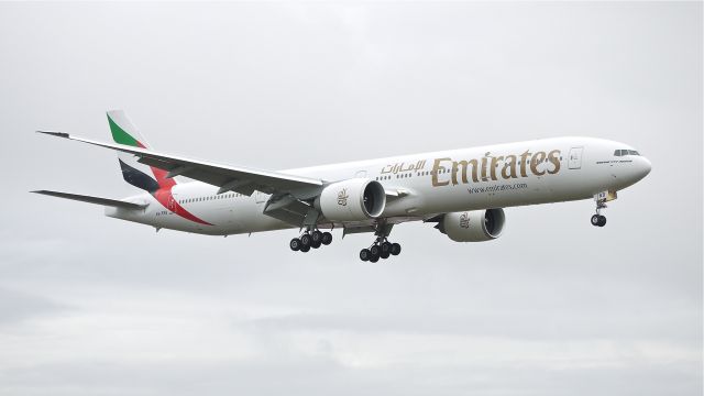 BOEING 777-300 (A6-ENB) - BOE924 on final approach to runway 16R to complete a flight test on 11/13/12. (LN:1055 c/n 41075).