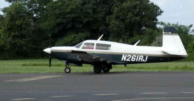 Mooney M-20 Turbo (N261RJ) - Taxiing to parking is this 1983 Mooney M20K-231 Turbo in the Summer of 2021.