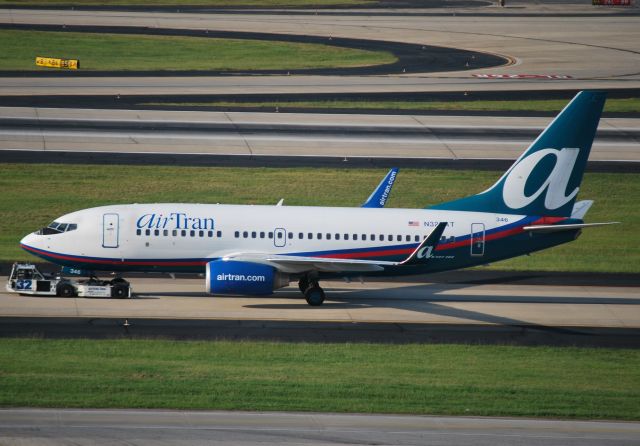 Boeing 737-700 (N328AT) - Being towed 6/17/12