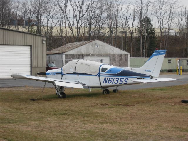 Beechcraft Sierra (N6135S) - Sitting in front of Twin City Airmotive.