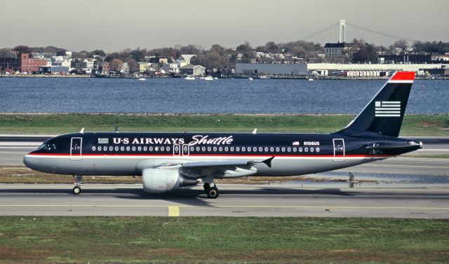 Airbus A320 (N106US) - The Hudson River infamous US A-320 N106US heads to the departure runway in KLGA in Nov 1999, only 3 months after delivery for another US Airways Shuttle flight, scanned from a slide.