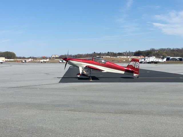 — — - Parked on the GA ramp next to the Runway Cafe.