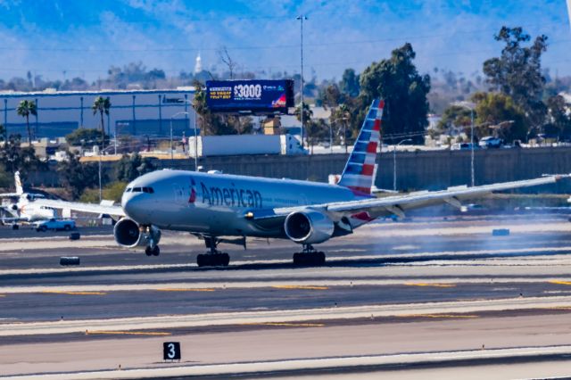 Boeing 777-200 (N770AN) - An American Airlines 777-200 landing at PHX on 2/10/23 during the Super Bowl rush. Taken with a Canon R7 and Canon EF 100-400 II L lens.