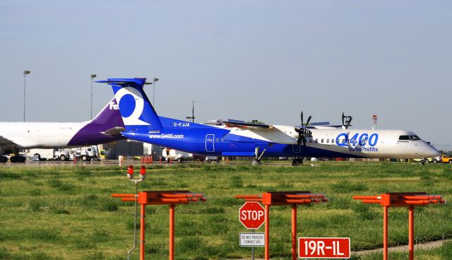 de Havilland Dash 8-100 (C-FJJA) - Waiting for a takeoff clearance for 19R. This Q400 did numerous VFR takeoff/circle/land flights.