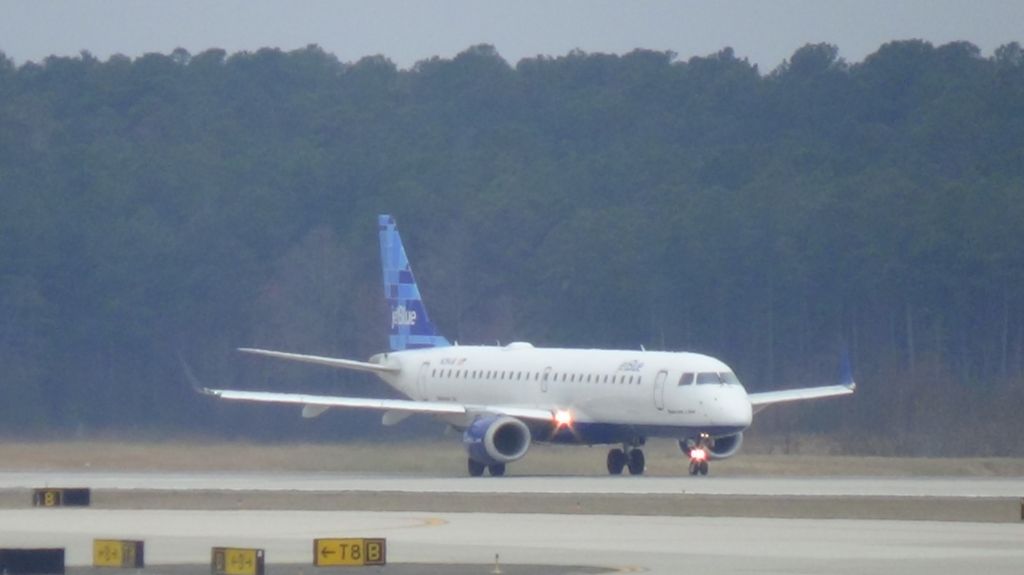Embraer ERJ-190 (N284JB) - jetBlue 1193 Departing to Boston at 1:06 P.M.   Taken March 19, 2015.