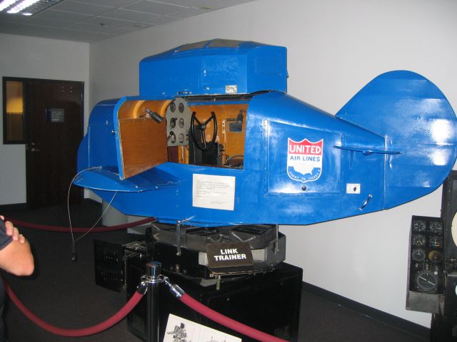 — — - Link Trainer at UAL pilot training center in DEN