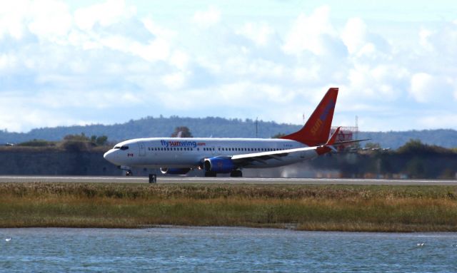 Boeing 737-800 (C-FTJH) - Sunwings doing a charter for Apple Vacations. 