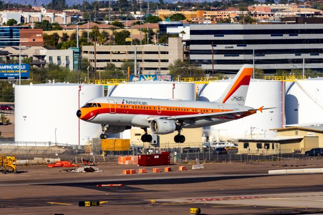 Airbus A319 (N742PS) - American Airlines A319 in PSA retro livery landing at PHX on 10/29/22. Taken with a Canon 850D and Tamron 70-200 G2 lens.
