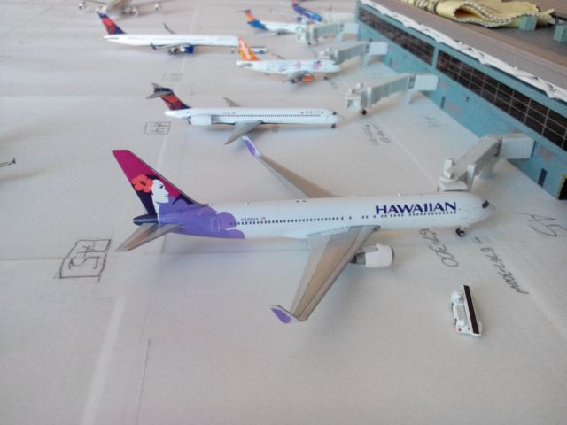 BOEING 767-300 (N590HA) - This is another 1 400 scale model of mine. The passengers on this Hawaiian 767-300 are disembarking from Honolulu. The planes in the background are, Delta Airlines MD-90, Skybus Airlines A319, Delta Airlines 757-300, Allegiant Air MD-83, and Sun Country 737-800.