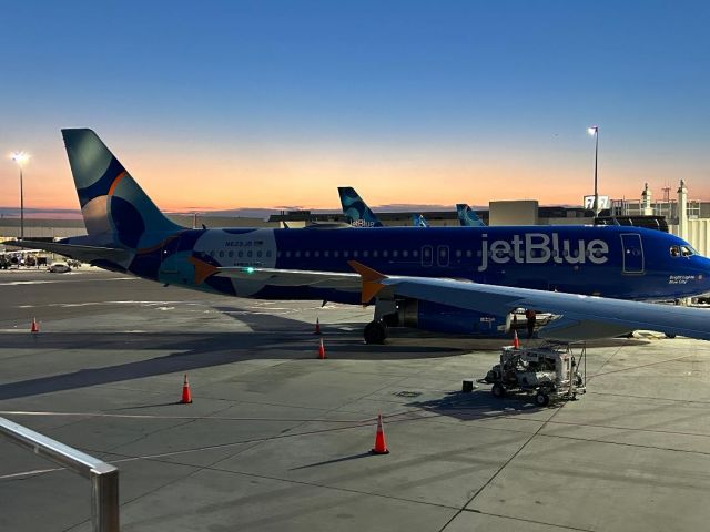 N629JB — - The sun rising on N629JB and a MINT A321 headed to SFO behind it.