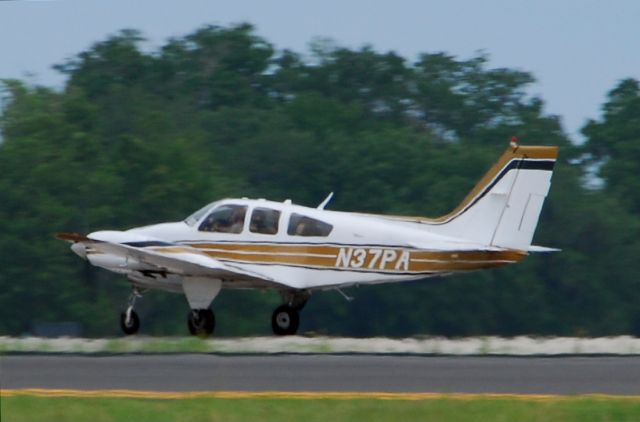 Beechcraft Baron (58) (N37PA) - 2013 Sun n Fun Parade of Planes