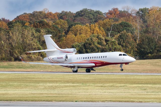 Dassault Falcon 7X (N143RE) - N143RE is a 2007 Dassault Falcon 7X seen here departing Atlanta's PDK executive airport. I shot this with a Canon 100-400mm IS II lens at the focal length of 200mm. Camera settings were 1/5300 shutter, F5, ISO 500.  Please check out my other photography. Votes and positive comments are always appreciated. Questions about this photo can be sent to Info@FlewShots.com