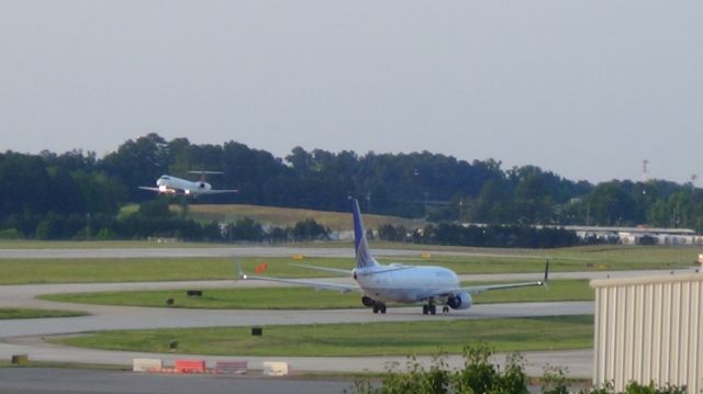 Boeing 737-800 (N76515) - United 1150 departing to Newark at 7 :54 P.M.  Taken June 7, 2015.  